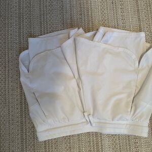 White shorts with biker shorts under